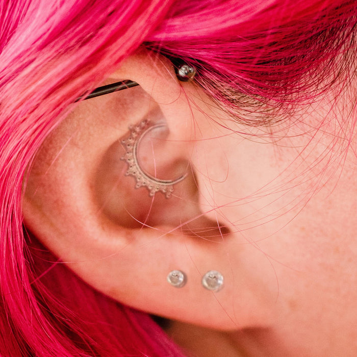 Combining Industrial Piercings with Other  Ear Piercings for a Unique Look