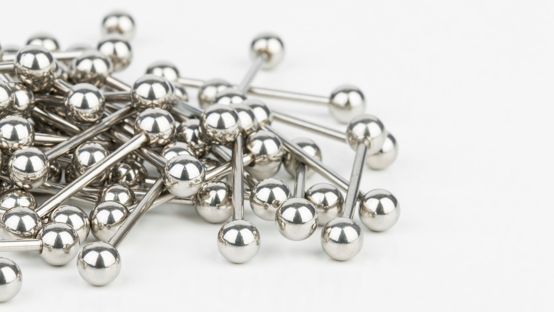 Ultimate Guide to Industrial Piercing Barbells, Sizing Styles and Aftercare Tips